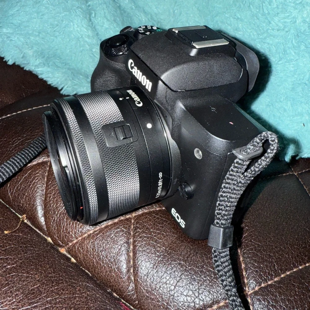 Canon Black DSLR Camera with Strap